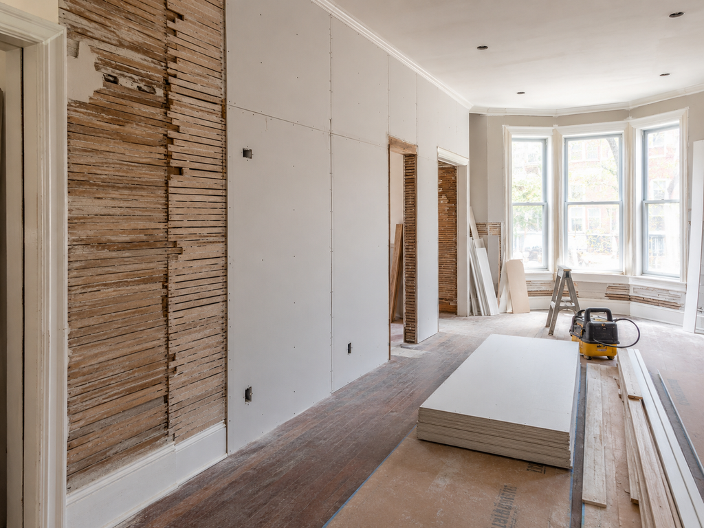 Drywall Installation Over Historic Plaster & Lath in Philadelphia Rowhomes shown in a realistic Philadelphia, PA residential construction setting.