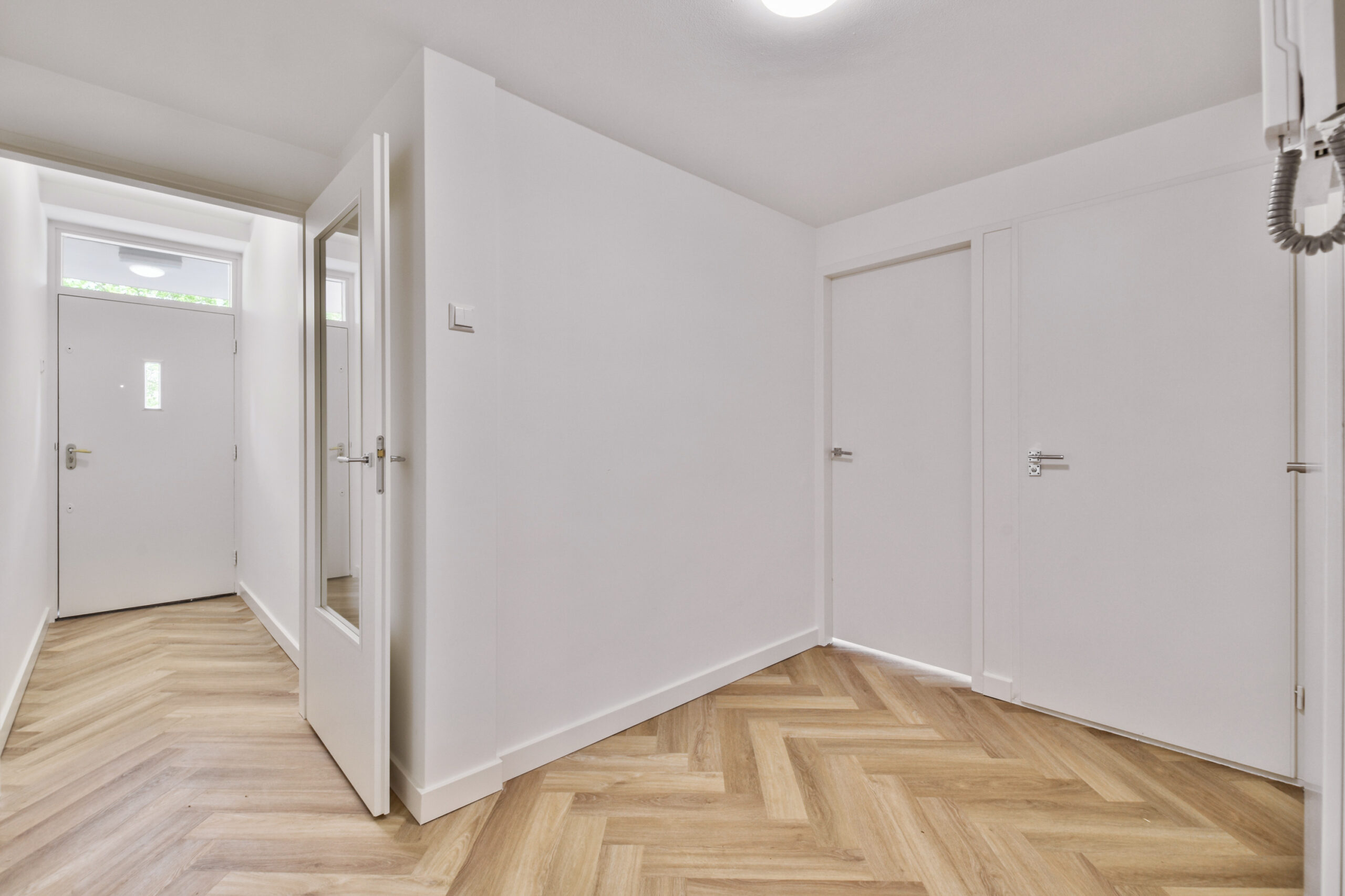Replacing Interior Doors in Out-of-Square Philadelphia Rowhome Openings shown in a realistic Philadelphia, PA residential construction setting.